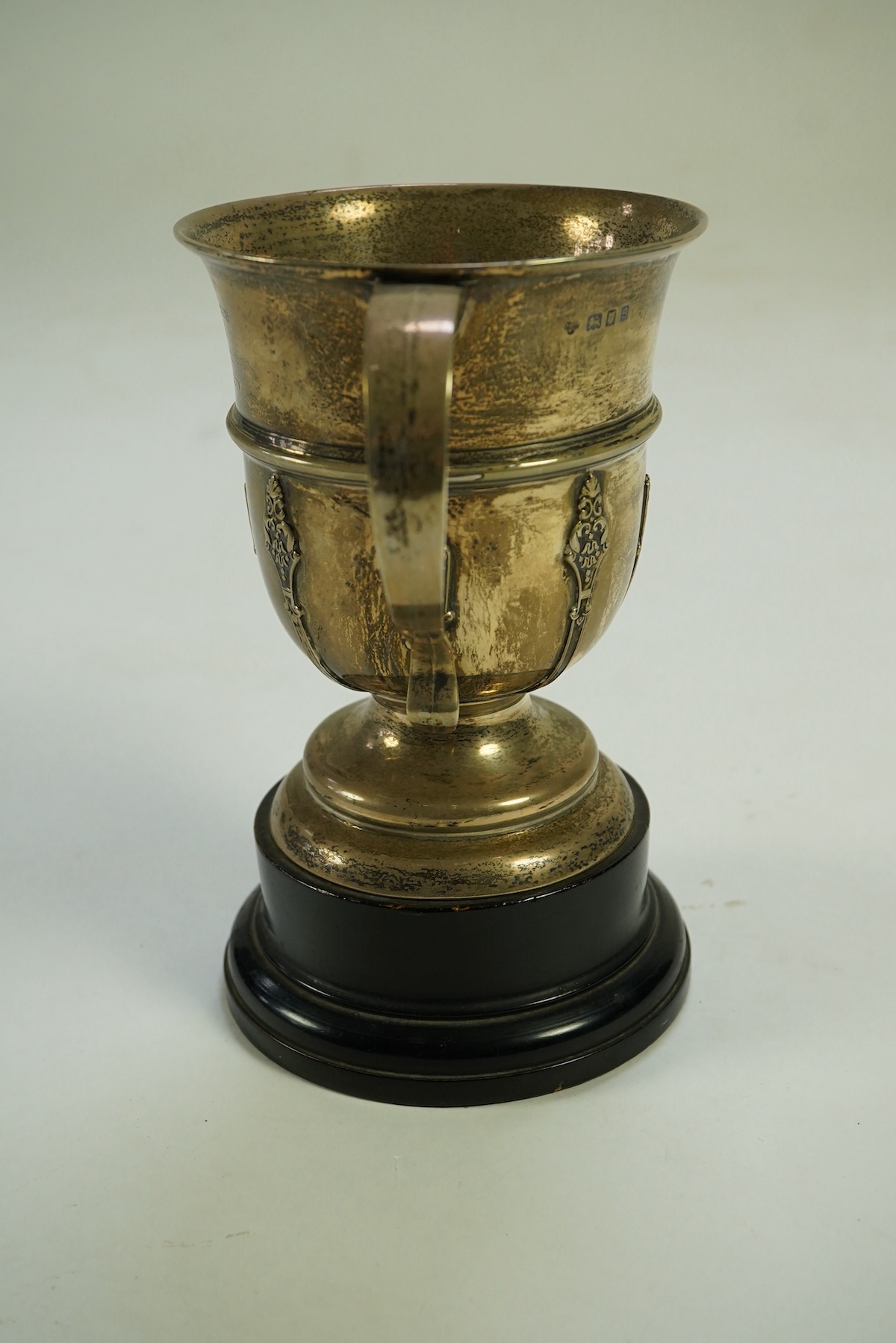 A George V silver two handled presentation trophy cup by The Goldsmiths & Silversmiths Co Ltd, with engraved horse racing inscription relating to 'The Arab Cup Bideford Races'